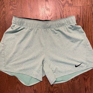 Nike size medium teal women’s althletic shorts
